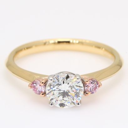 Luminous Argyle pink and white round-cut diamond three-stone engagement ring