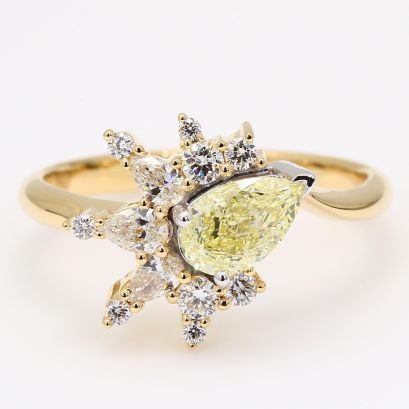 Marie pear and round-cut fancy yellow and white diamond ring