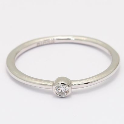 Armada white diamond bezel ring
