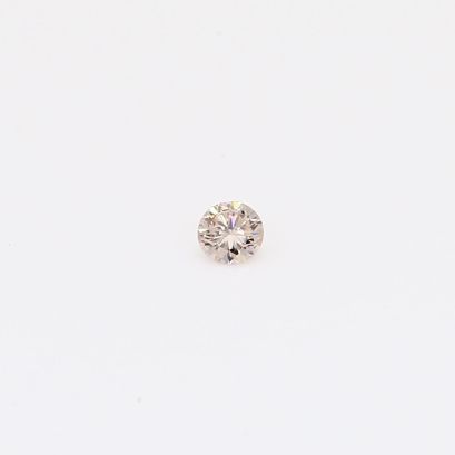 0.06 Carat round-cut Argyle intense pink champagne diamond