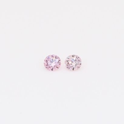 0.09 Total carat pair of round-cut FPP Argyle pink diamonds