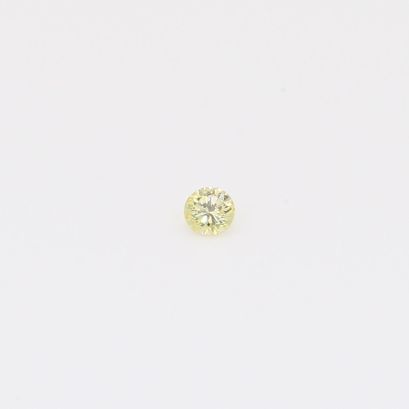0.035 Carat round-cut fancy yellow diamond