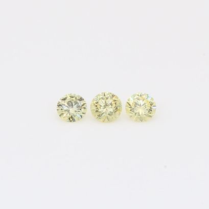 0.18 Total carat trio of round-cut fancy yellow diamonds