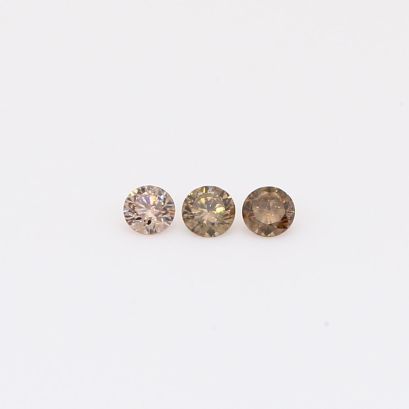 0.12 Total carat trio of round-cut champagne diamonds