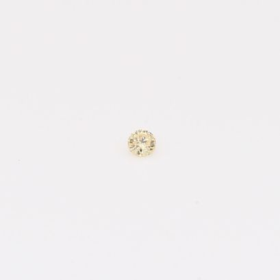 0.02 Carat round-cut fancy apricot diamond