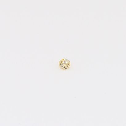 0.01 Carat round-cut fancy apricot diamond