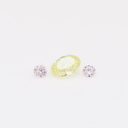 0.26 Total carat trio of round-cut Argyle fancy light pink and oval-cut fancy light yellow diamonds