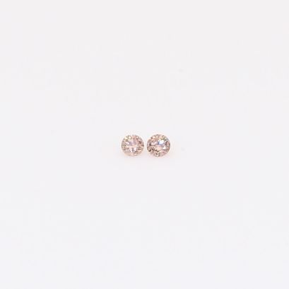0.02 Total carat pair of round-cut Argyle intense pink champagne diamonds