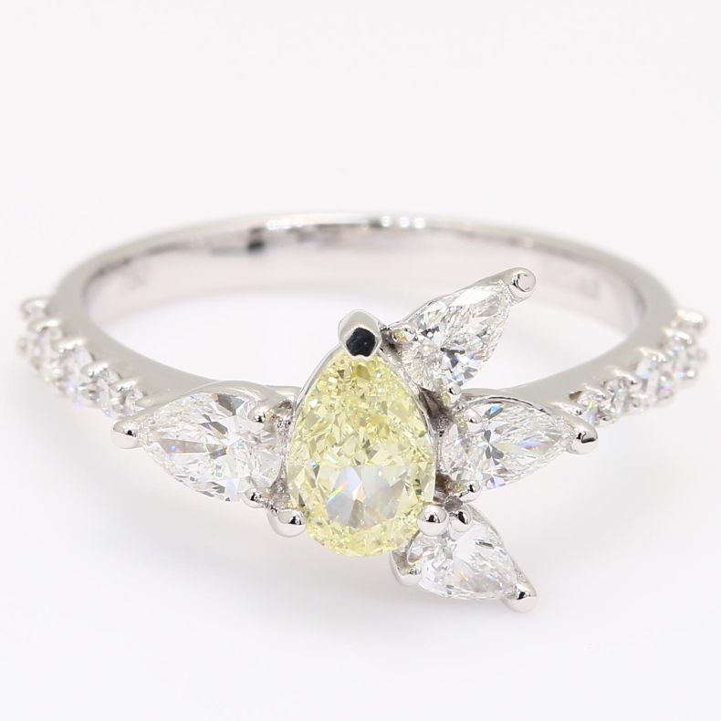 Theresa pear and round-cut fancy yellow and white diamond ring