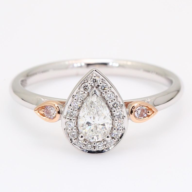 Alicorn pear and round-cut white and Argyle light pink champagne diamond halo ring