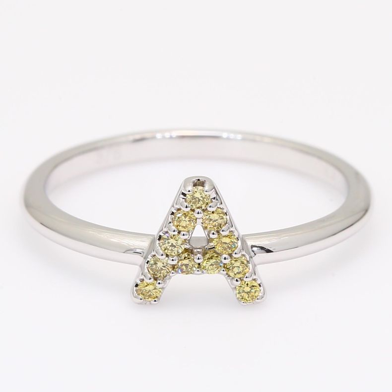 Love Letter A fancy yellow diamond ring