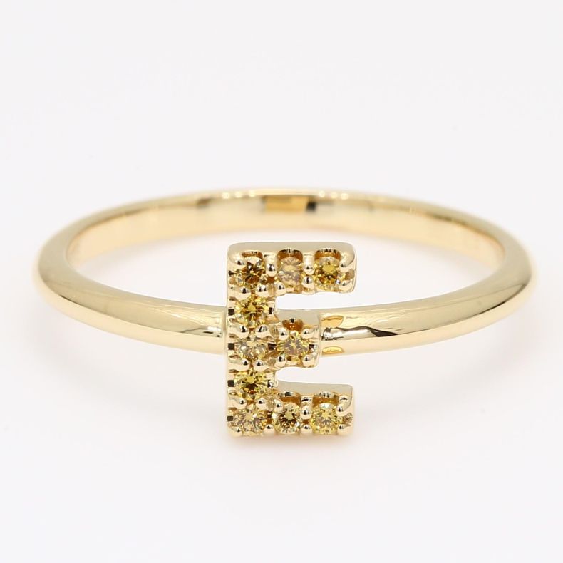 Love Letter E fancy orange diamond ring