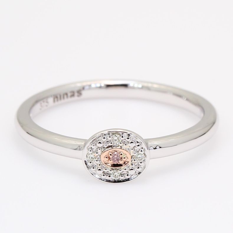 Isla Argyle light pink champagne and white diamond halo ring