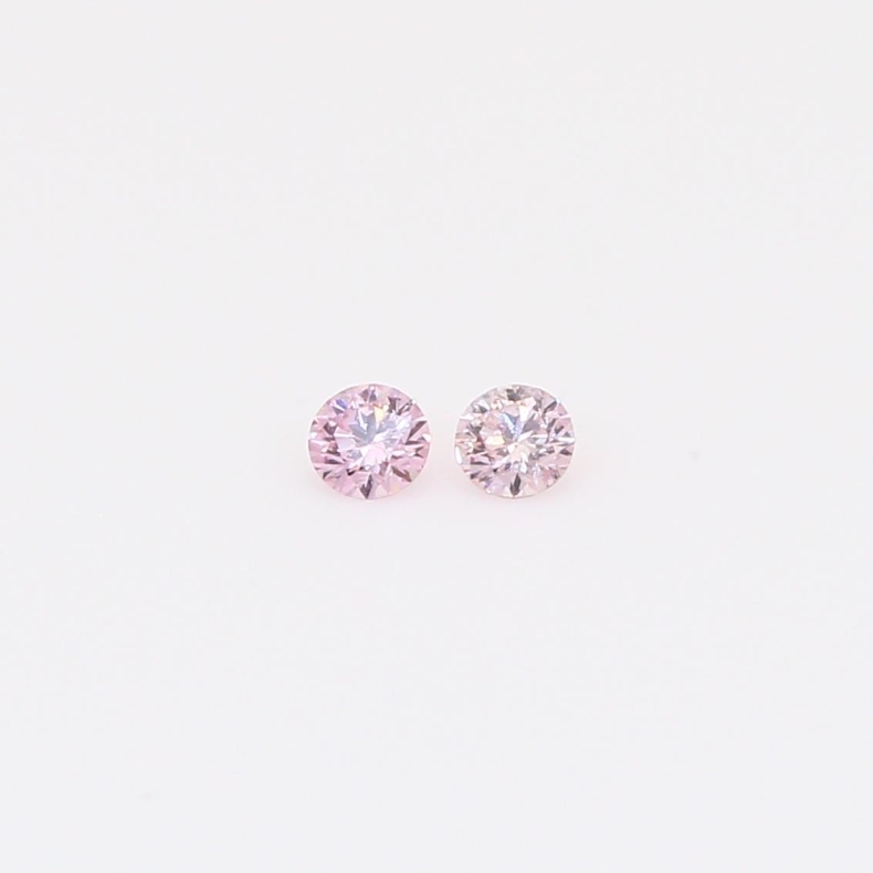 0.09 Total carat pair of round-cut FPP Argyle pink diamonds