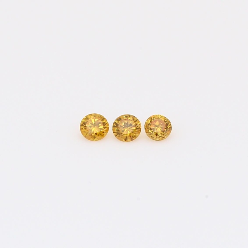 0.09 Total carat trio of round-cut fancy intense orange diamonds