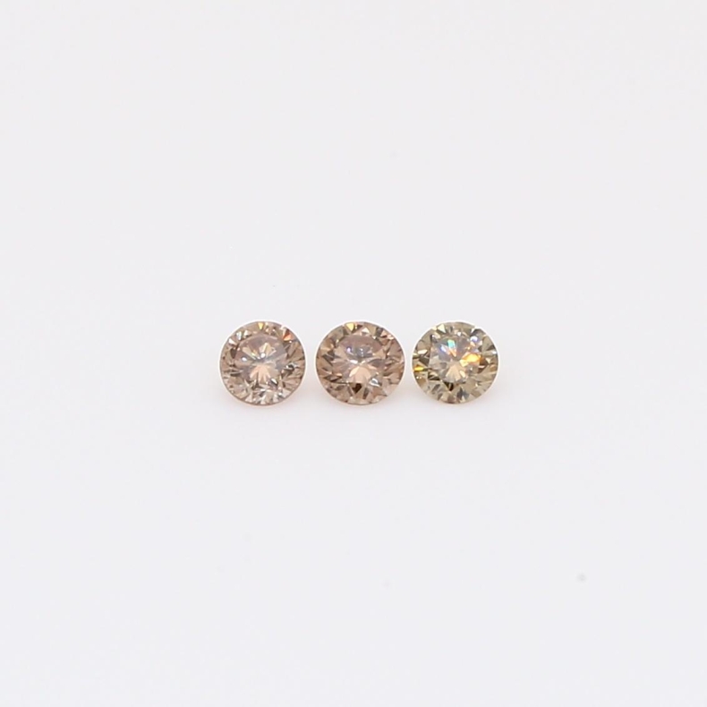 0.105 Total carat trio of round-cut champagne diamonds
