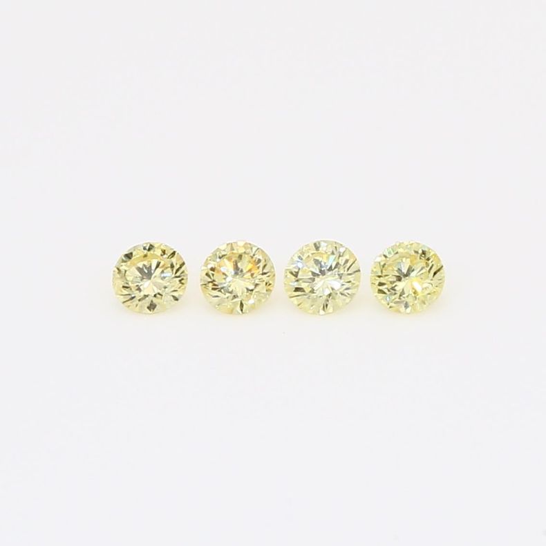 0.20 Total carat parcel of round-cut fancy yellow diamonds