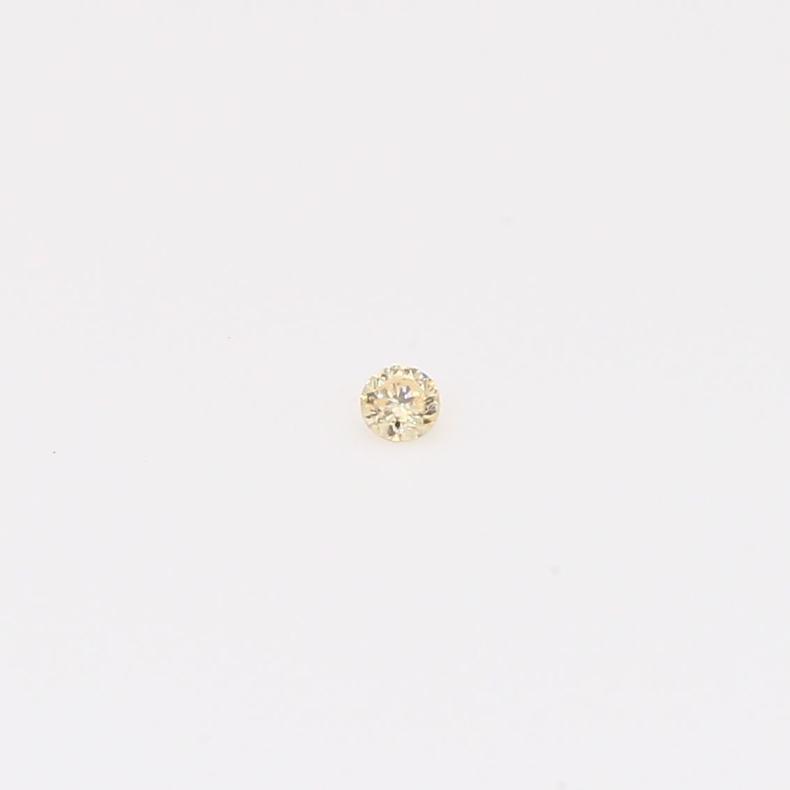 0.02 Carat round-cut fancy apricot diamond