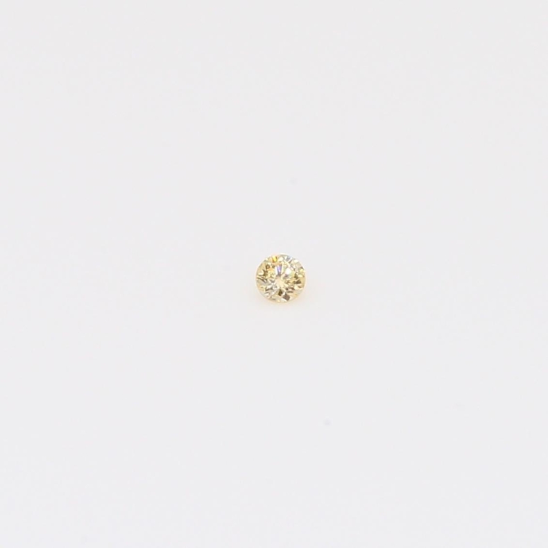 0.01 Carat round-cut fancy apricot diamond