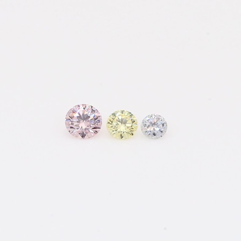 0.125 Total carat trio of round-cut rainbow diamonds