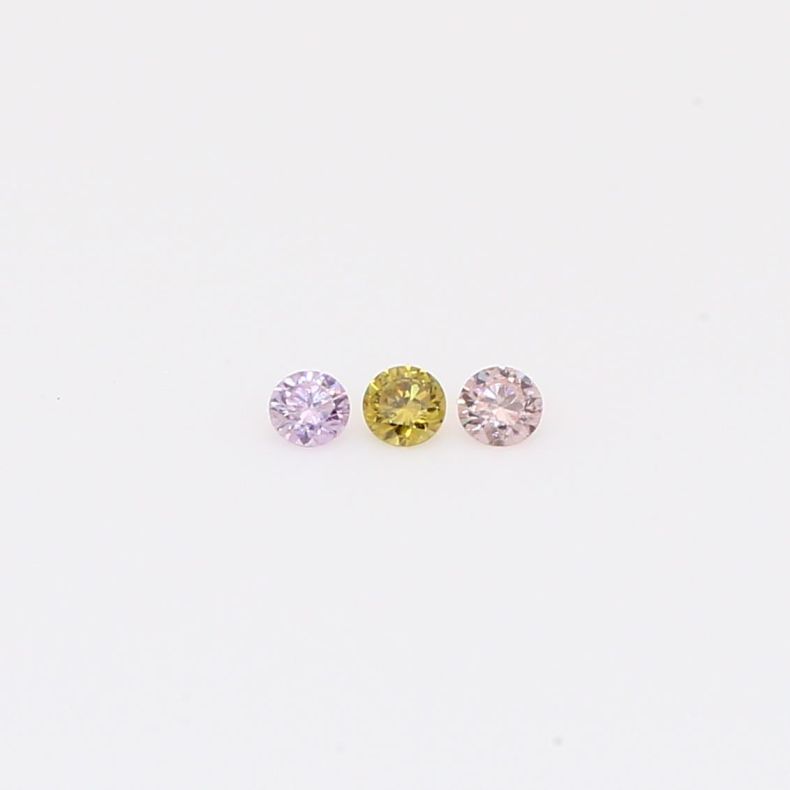 0.06 Total carat trio of round-cut rainbow diamonds