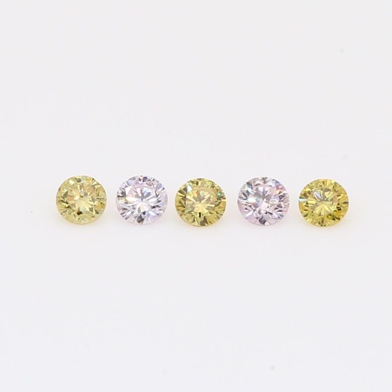 0.19 Total carat parcel of round-cut fancy purple and fancy green diamonds