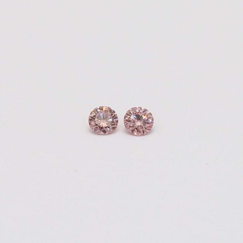 0.06 Total carat pair of round-cut FIPP Argyle pink diamonds